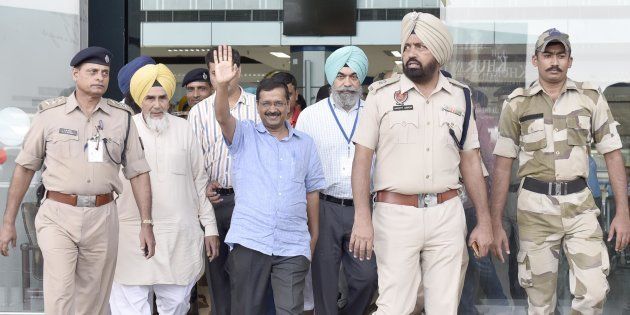 AMRITSAR, INDIA - JULY 17: Delhi CM Arvind Kejriwal waving towards party workers after reaching airport on July 17, 2016 in Amritsar, India.