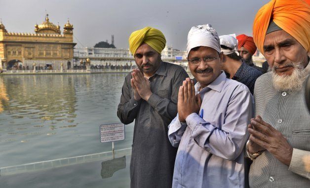 File photo of Delhi Chief Minister Arvind Kejriwal, MP Bhagwant Mann, AAP leader Sucha Singh Chhotepur paying obeisance at Golden Temple, on February 28, 2016 in Amritsar, India.