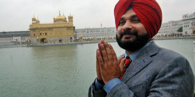 File photo of cricketer-turned-politician Navjot Singh Sidhu prays in front of the Golden Temple, after his victory in Amritsar, India, Tuesday, Feb. 27, 2007.