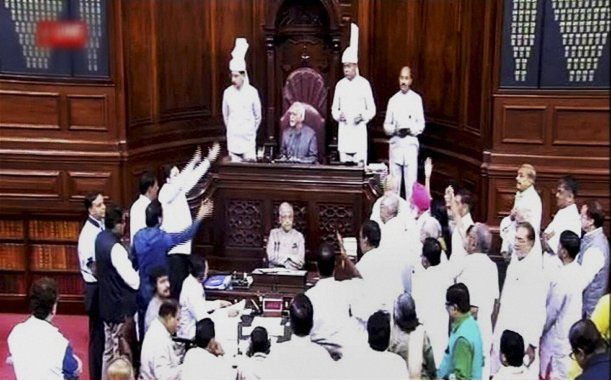 New Delhi: Members raise a protest in the Rajya Sabha during Monsoon session of Parliament in New Delhi on Wednesday. PTI photo/ TV grab (PTI7_20_2016_000088B)