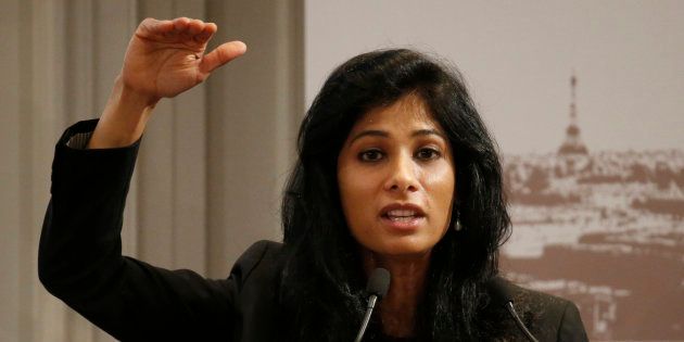 Gita Gopinath, professor at the economics department of Harvard University, gestures as she speaks during a conference of central bankers hosted by the Bank of France in Paris November 7, 2014. REUTERS/Charles Platiau (FRANCE - Tags: BUSINESS)
