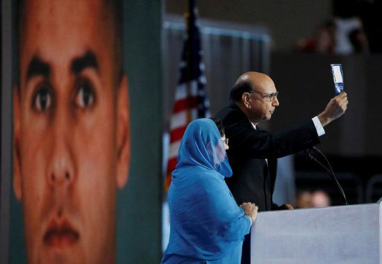 Khizr Khan, who's son Humayun (L) was killed serving in the U.S. Army, challenges Republican presidential nominee Donald Trump to read his copy of the U.S. Constitution, at the Democratic National Convention in Philadelphia, Pennsylvania, U.S. July 28, 2016. REUTERS/Lucy Nicholson TPX IMAGES OF THE DAY