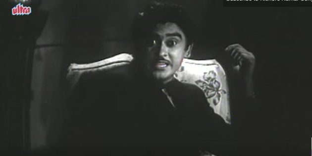 Kishore Kumar in a scene from the movie 'Adhikar' (1954).
