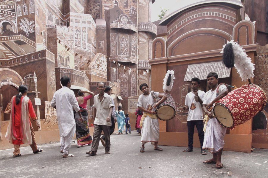 The dhakis playing at the 66 Pally Durga Puja in south Kolkata. 56-year-old artist Purnendu De who hails from Burdwan district suggested to the organisers that on the 66th year of their Pujas, they could revisit and then recreate what Kolkata may have looked like 66 years ago. Among many Kolkata landmarks he replicated for the pandal premises, was Howrah bridge, various churches, Nakhoda Masjid, the Akashvani Bhavanand so on. The organisers say that about one million people have visited this particular pandal in the last 5 days.