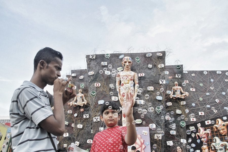 The organisers of the FD Block Puja in Salt Lake wanted to portray how our lives are completely dominated and run by mobile apps.