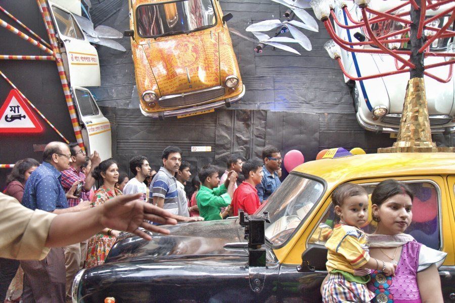 Habu Saha, secretary of 33 Palli Bashi Brinda Pujo in Beliaghata, has been fascinated with the iconic yellow taxi in Kolkata. He got in touch with artiste Shib Shankar Das who built this entire pandal with scrap from real ambassador taxis. He said, "The ambassador car and the yellow taxi was a prominent symbol of Kolkata, until very recently Hindustan motors stopped its production in its Uttarpara factory in the outskirts of Kolkata. It's never going to come back. We want to pay our tribute to the iconic car." They have also made small videos about yellow taxis in Kolkata which they are sharing on social media.