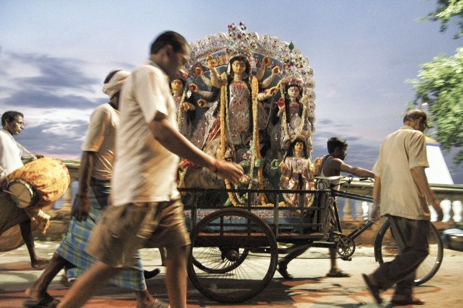 On the last day of the Puja, members of the Sri Sri Sridhar Jew, an old Kolkata 'thakurbari' which has been organising Pujas for the past 200 years, go to one of the ghats in Bagbazaar to immerse the Durga idol.