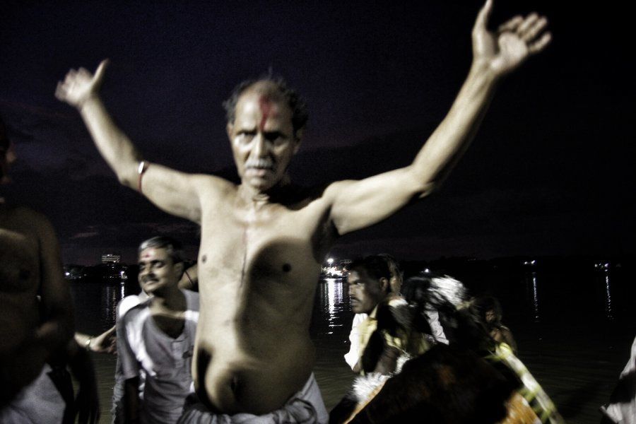 An excited man during the immersion on the last day of the Durga Puja.