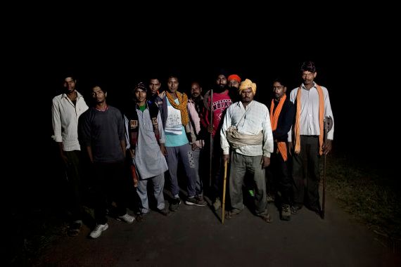 Members of a cow vigilante group pose for a photograph out on a patrol in the hopes of stopping vehicles of cow smugglers November 8, 2015 in Ramgarh, Rajasthan.