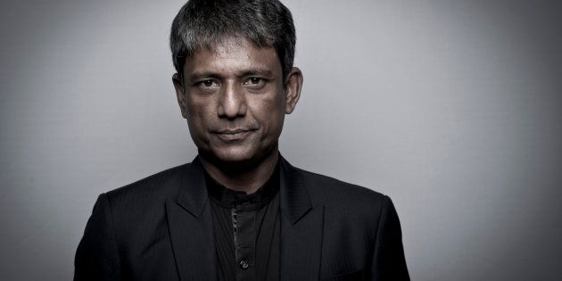 DUBAI, UNITED ARAB EMIRATES - DECEMBER 09: (EDITORS NOTE: This image has been desaturated and a vignette has been added) Actor Adil Hussain during a portrait session on day one of the 9th Annual Dubai International Film Festival held at the Madinat Jumeriah Complex on December 9, 2012 in Dubai, United Arab Emirates. (Photo by Gareth Cattermole/Getty Images for DIFF)