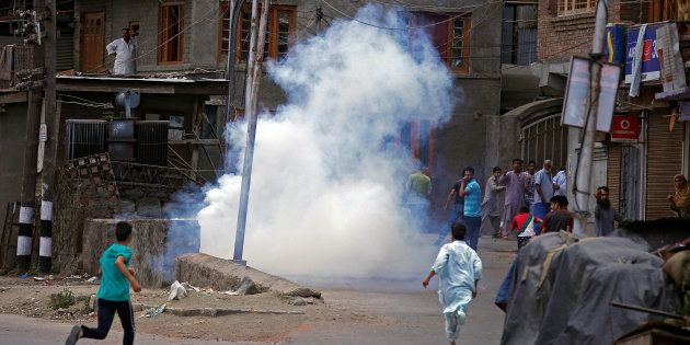 Police (not pictured) fire tear gas during a protest in Srinagar against the recent killings in Kashmir, August 11, 2016. REUTERS/Danish Ismail