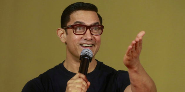 Bollywood actor Aamir Khan speaks to the media during the poster launch of his film 'Dangal' in Mumbai, India.