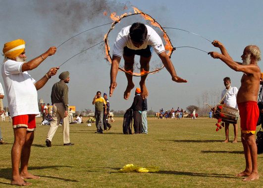 A participant performs during sports festival