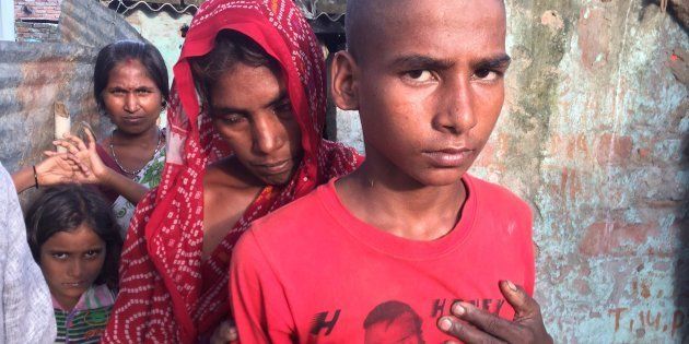Jhanjhat Manjhi's wife says the police threatened to arrest her and her three minor sons, and even confiscate her house, if she asked for a post-mortem on her husband's body. There is no breadwinner left in the family.