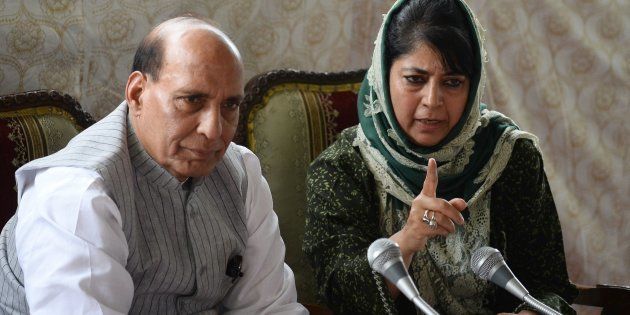 Chief minister of Jammu and Kashmir, Mehbooba Mufti (R) addresses a joint press conference with Indian home minister Rajnath Singh in Srinagar on 25 August, 2016.