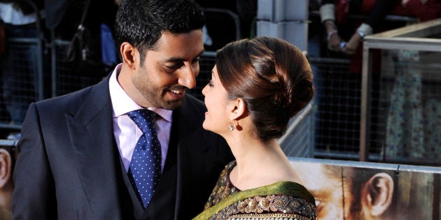 Married Bollywood couple Abhishek Bachchan (L) and Aishwayra Rai Bachchan arrive for the world premiere of their film 'Raavan' at the BFI in London, June 16, 2010. REUTERS/Paul Hackett (BRITAIN - Tags: ENTERTAINMENT SOCIETY)