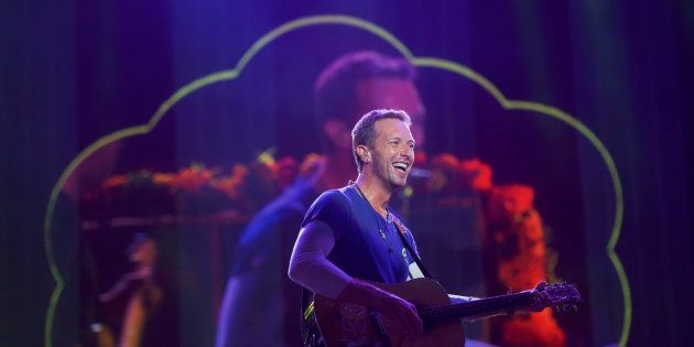 Chris Martin of Coldplay performs during the fifth annual Made in America Music Festival in Philadelphia.