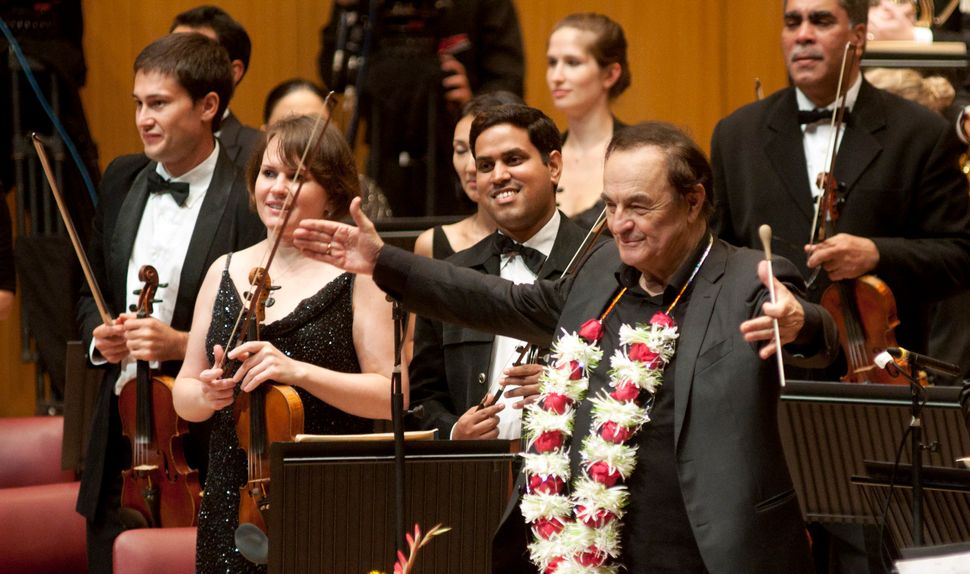 Internationally-renowned Swiss conductor Charles Dutoit following his first performance with the SOI in 2013. Maestro Dutoit returned in 2015 to lead a highly-acclaimed performance of Dvořák's 'New World' symphony.