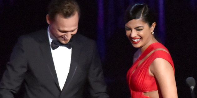 Tom Hiddleston and Priyanka Chopra speak onstage during the 68th Annual Primetime Emmy Awards at Microsoft Theater on September 18, 2016 in Los Angeles, California. (Photo by Jeff Kravitz/FilmMagic)