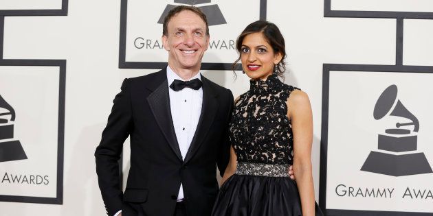 Film composer Mychael Danna and his wife Aparna Bhargava arrive at the 56th annual Grammy Awards in Los Angeles, California January 26, 2014.