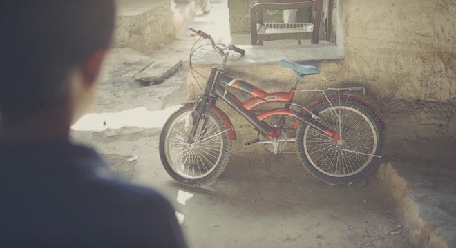 The protagonist with his eyes fixed on the bicycle | Shahana Khan Khalil/YouTube