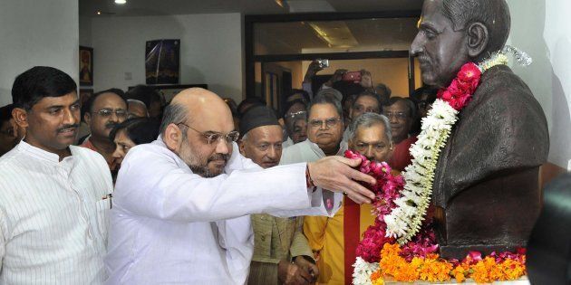 BJP leader Amit Shah along with others pay tribute to Deen Dayal Upadhyay on his birth anniversary at Bharatiya Janata Party Head Office on September 25, 2015 in New Delhi, India. (Photo by Vipin Kumar/Hindustan Times via Getty Images)