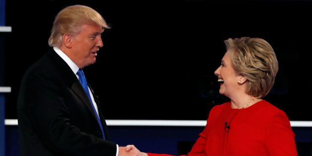 Republican U.S. presidential nominee Donald Trump and Democratic U.S. presidential nominee Hillary Clinton shake hands at the end of their first presidential debate at Hofstra University in Hempstead, New York, U.S., September 26, 2016.