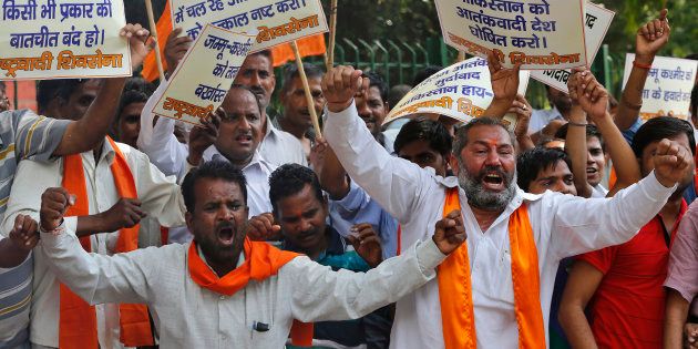 Supporters of Shiv Sena shout slogans during a protest against militant attack in Jammu.