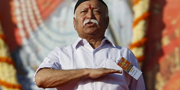 Mohan Bhagwat, chief of Rashtriya Swayamsevak Sangh (RSS), gestures as he prays during a conclave on the outskirts of Pune, India, January 3, 2016.