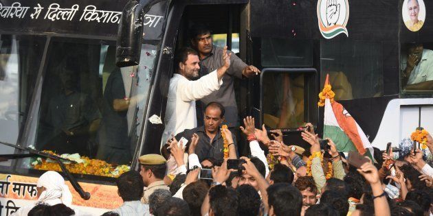 Congress Vice President Rahul Gandhi greets supporters as his bus rally enters the city on October 6, 2016 in New Delhi, India.