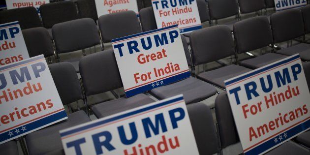 Signs expressing Hindu support for Republican presidential candidate Donald Trump are seen during a Hindu political organization's anti-terror fundraiser, October 15, 2016.