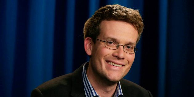 John Green, author of "The Fault in Our Stars," poses during an interview in New York on Monday, June 2, 2014. (AP Photo/Richard Drew)
