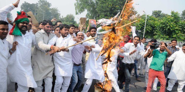 Supporters of Uttar Pradesh Chief Minister Akhilesh Yadav protesting against Amar Singh outside 5 Kalidas CM residence, on October 23, 2016 in Lucknow.