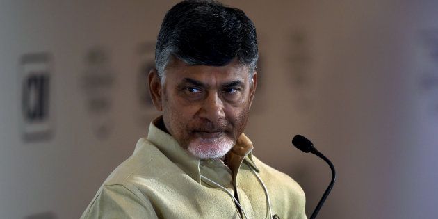 Chief Minister of Andhra Pradesh, N. Chandrababu Naidu looks on as he attends the session 'Cities as Engines of Growth' during the second day of the India Economic Summit in New Delhi on October 7, 2016. / AFP / MONEY SHARMA (Photo credit should read MONEY SHARMA/AFP/Getty Images)