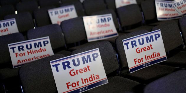 Signs are ready for attendees to hold during Republican presidential nominee Donald Trump's remarks at a Bollywood-themed charity concert put on by the Republican Hindu Coalition in Edison, New Jersey, U.S. October 15, 2016. REUTERS/Jonathan Ernst