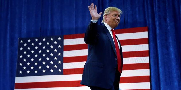 Republican presidential nominee Donald Trump arrives for a campaign rally in Greeley, Colorado, U.S. October 30, 2016. REUTERS/Carlo Allegri