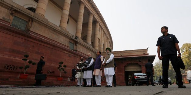 Prime Minister Narendra Modi speaks to the media inside the parliament premises on the first day of the winter session.