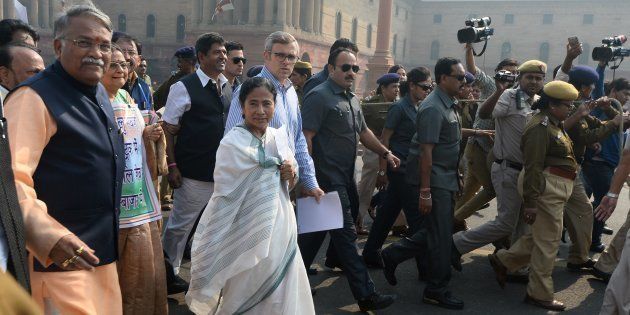 West Bengal Chief Minister and leader of opposition Trinamul Congress Mamata Banerjee towards the President's House in protest against the removal of high denomination currency notes from circulation.