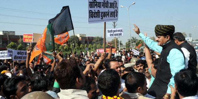 BJP MLA Bhawani Singh Rajawat demonstrating at Bharti-Walmart Store in protest of Foreign direct investment in multi-brand retail.