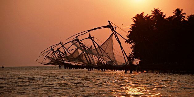 Chinese fishing nets line the mouth of the harbour at Fort Cochin, an old Portuguese town in Kerala.