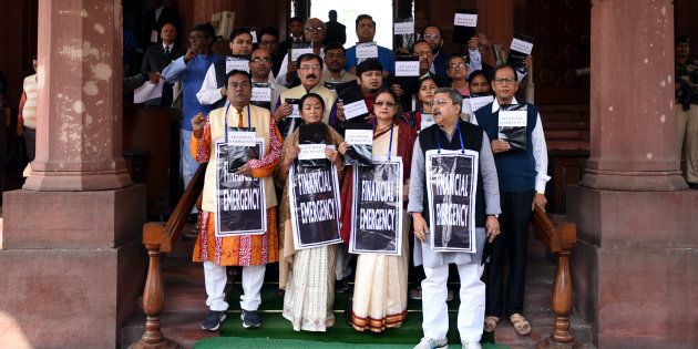 TMC members protest at the Parliament.