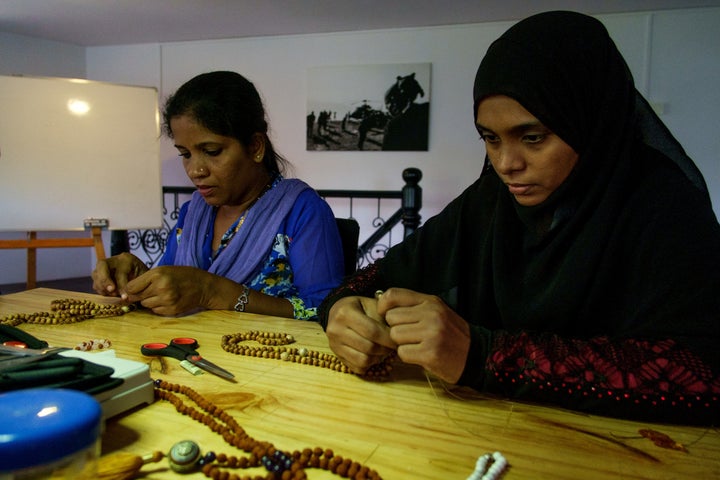 Skilled but disenfranchised women at Khusi Hona's Lotus Centre in Goa making a piece of art.