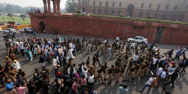 Delegation of members of parliamentarians and leaders from various political parties march towards the Rashtrapati Bhavan protesting against demonetisation.