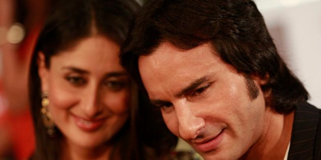 Bollywood actor Saif Ali Khan (R) arrives with actress Kareena Kapoor on the green carpet for the International Indian Film Academy (IIFA) awards in Colombo June 5, 2010.