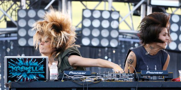 Jahan Yousaf (L) and Yasmine Yousaf of the U.S. electronic dance music group Krewella perform at the 2013 Wango Tango concert at the Home Depot Center in Carson, California.
