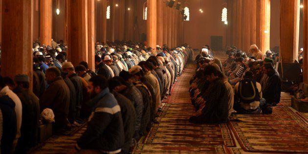 Kashmiri Muslims pray during the Friday prayer in Jamia Masjid in downtown Srinagar on November 25, 2016. TAUSEEF MUSTAFA/AFP/Getty Images.