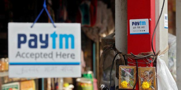 Advertisements of Paytm, a digital wallet company, are seen placed at stalls of roadside vegetable vendors in Mumbai, India, November 19, 2016. REUTERS/Shailesh Andrade