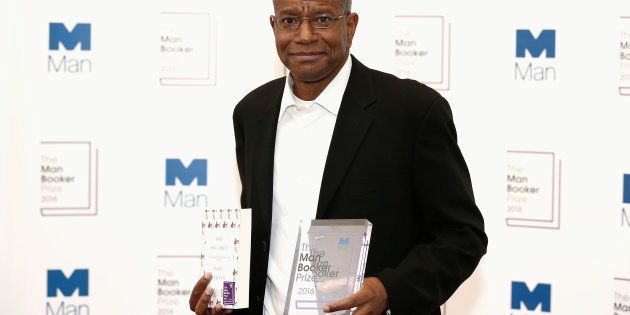 Winner of the 2016 Man Booker Prize Paul Beatty poses with his novel 'The Sellout' at the 2016 Man Booker Prize at The Guildhall on October 25, 2016 in London, England. REUTERS/John Phillips/Pool