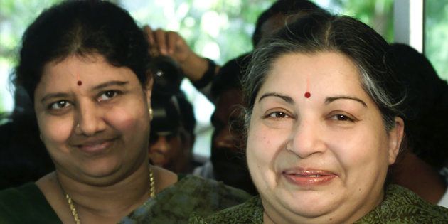 File photo of former filmstar and powerful regional politician Jayaram Jayalalitha (C), leader of the opposition AIADMK party alliance, with her companion Sasikala Natarajan (L) in Madras, May 10, 2001.