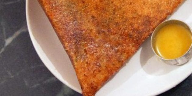 The crisp masala dosa with ghee on the side at MTR, Lalbagh.